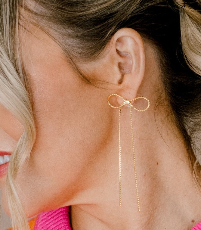 Collection of Golden Bow Bliss Earrings in a gallery layout