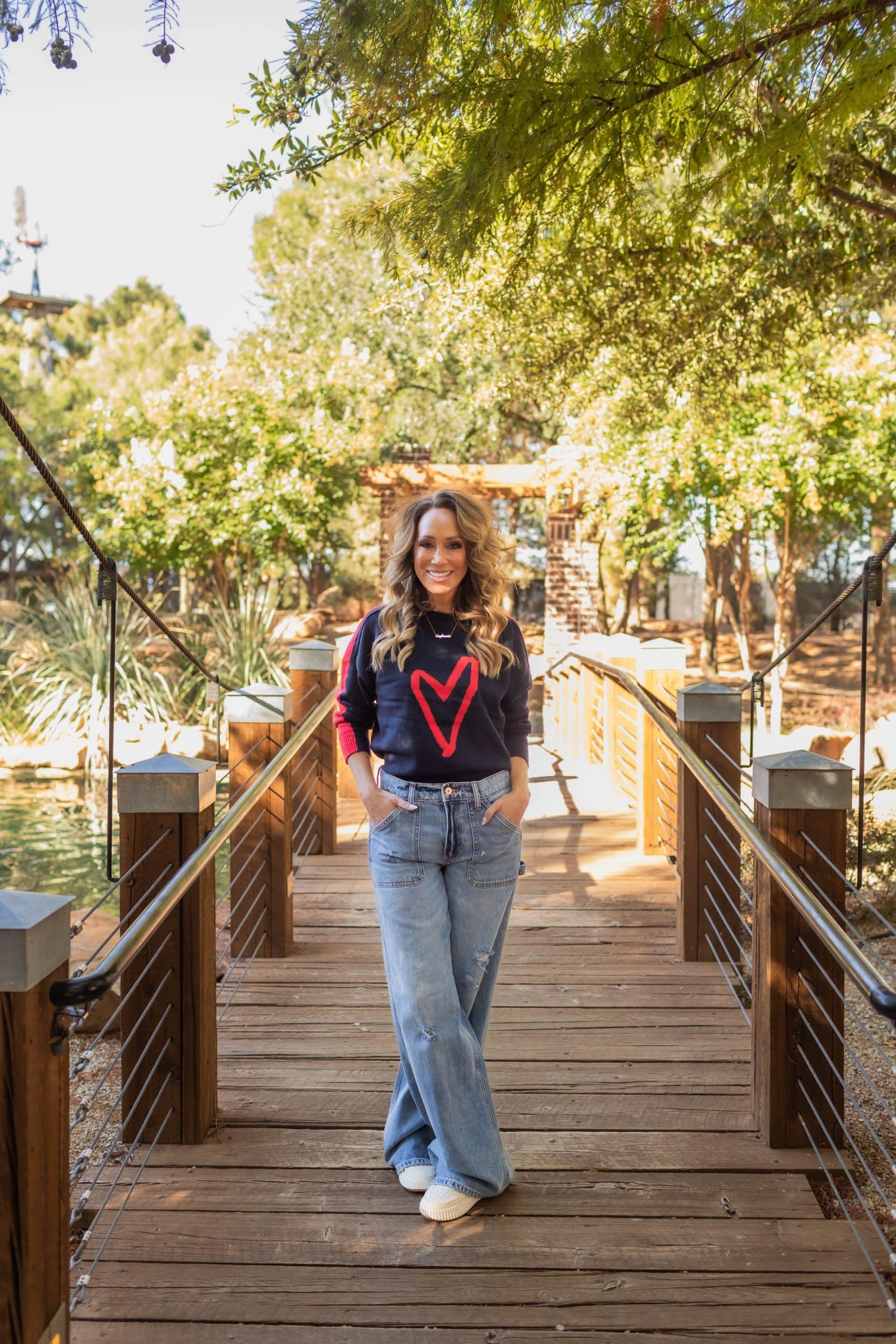 Collection of Lottie Striped Heart Sweater in a gallery layout